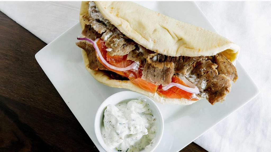 Gyro Pitawich · Deliciously Sliced Gyro - Tomato - Onion - Cucumber Sauce
*served in pita