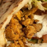 Chicken Shawarma Pitawich · Mouth Watering Chicken - Lettuce - Onion - Tomato - Arab Pickle - Mo's Sauce
*served in pita
