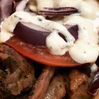 Beef Shawarma Pitawich · Fresh Beef Shawerma - Red Onions - Mo's Sauce