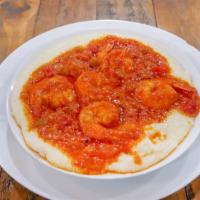 Shrimp & Grits · Southern creamy grits topped with creole shrimp served with your choice of texas toast, butt...