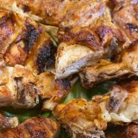 Whole Bbq Chicken · Frango de churrasco.