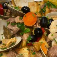 Pork Cubes With Clams And Cubes Fries · Comes with cubed potatoes (Carne alentejana)