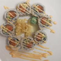 Spicy Salmon Roll · Spicy Salmon and Cucumber. Rice on the outside.   
 8 pieces.      Spicy Mayo on the Top!!!!!