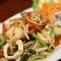 Andaman Seafood · Gluten free.Hot. Stir-fried shrimp, squid, scallops and mussels with onion, bell pepper, mus...
