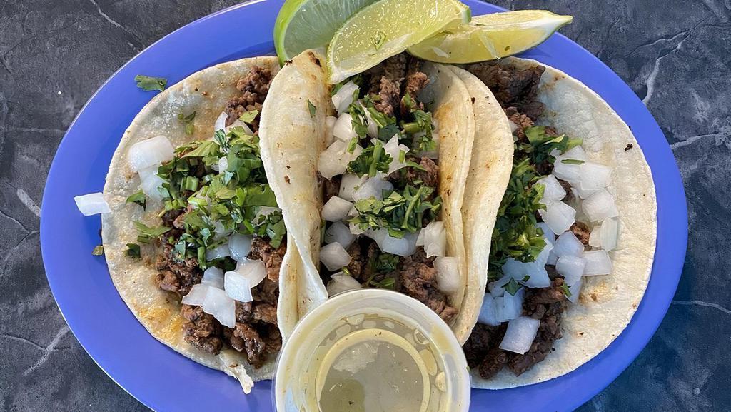 Carne Asada Taco (Steak) (3) · Grilled Beef, Diced certified Angus beef carefully tenderized and grilled to juicy perfection. Serve with Mexican rice and Re-fried  beans.