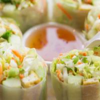 Summer Rolls · Hand-rolled soft rice paper stuffed with fresh iceberg lettuce, tofu, cucumber, carrot and c...