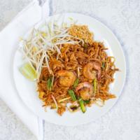 Pad Thai Noodle · Vegetarian. Pan-fried noodles with egg in tamarind sauce with bean sprouts and carrots,
serv...
