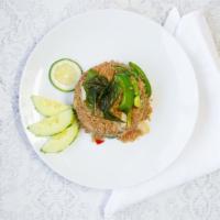 Basil Fried Rice · Spicy. Vegan. Jasmine rice stir-fried medium-spicy basil sauce with mushrooms, onion, and be...