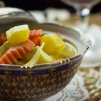 Yellow Curry · Spicy. Vegan. Pineapple, carrots, and onions in slightly spicy and sweet yellow coconut curr...