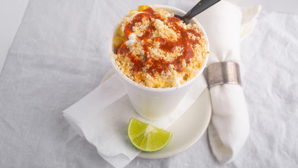 Elote · 12oz cup of corn. (Includes Sour Cream, Mayonnaise, Queso Fresco, Salsa, Lime).