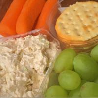 Chicken Salad Bento · Chicken salad, baby carrots, green grapes, and water crackers.