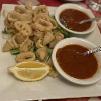 Fried Calamari · Deep-fried squid served with marinara sauce.