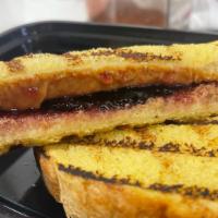 Grilled Pb&J · Grilled Peanut butter and jelly on Texas Toast