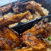 Wings · 4 whole wings with choice of Hennessy, Chipotle Mambo, Honey Butter Old Bay, Jerk BBQ, or Le...