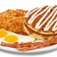 Cinnamon Roll Pancake Breakfast · Buttermilk pancakes cooked with cinnamon crumb topping and topped with cream cheese icing. S...