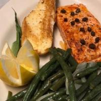 Grilled Salmon · Six ounce Salmon served with green beans and garlic bread.