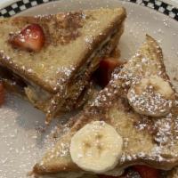 Nutella® Stuffed French Toast · Thick-sliced, stuffed with choice of fruit.