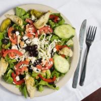 Greek Salad · Romaine, lettuce, tomatoes, chickpeas, green peppers, artichokes, pepperoncini peppers, Feta...