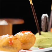 Fried Oreos W/ Ice Cream · Fried oreos with our in house small batch green tea ice cream.