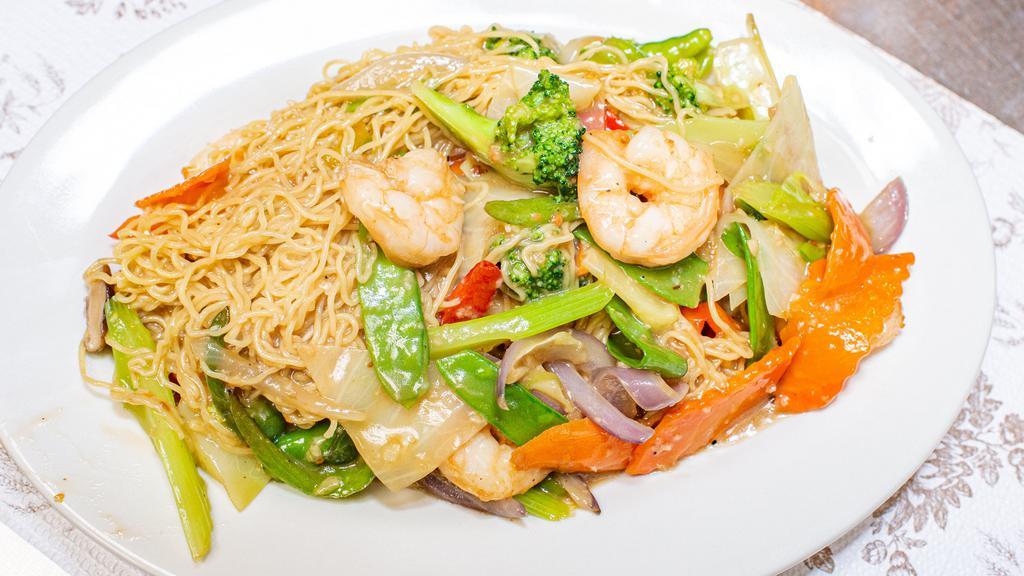 Soft/Crispy Egg Noodle Dish / Mì Xào Mem Hoặc Mi Xào Giòn · Your choice of protein tossed and stir-fried with mushroom, carrots, celery, snow peas, onions, bell peppers and broccoli in a subtly sweet and salt brown house sauce. Served over a bed of soft egg noodles or a nest of crispy egg noodles.