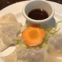 Steamed Wontons / Hoành Thánh Hấp · Four dumplings filled with minced shrimps, pork, garlic, onion and sesame oil. Steamed and s...