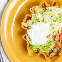 Taco Salad · Rachel Ripken's (Cal Ripken Jr.'s daughter) favorite! A crispy flour tortilla filled with gr...