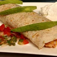 Burrito Azteca · A large burrito stuffed with grilled chicken or beef, rice, beans, onions, mushrooms, zucchi...