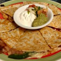 Veggie Quesadilla · A flour tortilla grilled and stuffed with cheese, mushrooms, onions, bell peppers and tomato...