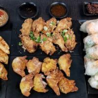 Party Plater 8S (Wings, Chicken Dumplings, Wontons, Salad Rolls) · - 8 crispy wings, 8 crispy chicken dumplings, 8 crispy pork & shrimp wontons and 8 shrimp & ...