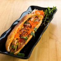 Bbq Char Siu Banh Mi · Banh mi (baguette) are made from scratch and bake fresh daily and filled bánh mì with our ma...