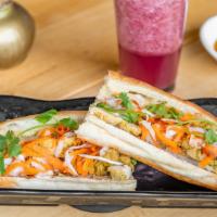 Lemongrass Grilled Chicken Banh Mi · banh mi (baguette) are made from scratch and bake fresh daily and filled bánh mì with our ma...