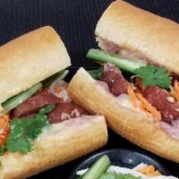 Grilled Meat Balls (Nem Nuong) Banh Mi · Bánh mì (baguette) are made from scratch and bake fresh daily and filled  with our mayo and ...