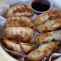 Chicken Dumplings · 8 organic chicken dumplings steamed or crispy. Served with house-made dumpling sauce and/or ...