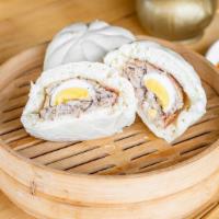 Hum Bao · Two fluffy steamed bun filled with pork, Chinese sausage, and egg.
