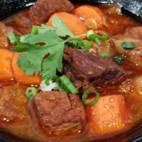 Beef Stew [Gf] · Marble beef slowed cooked until tender with an umami broth and rich and Asian spices and fla...