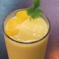 Mango Smoothie · Real mango blended with a touch of honey and yogurt.