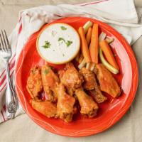 Moon Wings · Classic buffalo wings served with bleu cheese dressing.