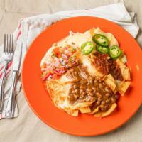 Nachos De Luna · Vegetarian. Topped with melted cheese, salsa, fresh jalapeños, pico de gallo, refried beans,...