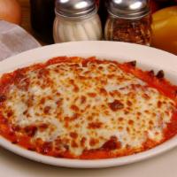 Baked Ravioli With Cheese · Served with meat sauce, baked with provolone mozzarella cheese and 3 pieces of garlic or reg...
