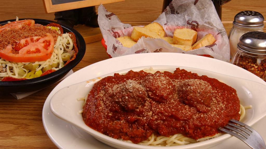 Spaghetti With Meat Sauce (No Cheese) · Served with meat sauce (or plain marinara sauce, if requested) and 3 pieces of garlic or regular buttered bread
