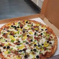 Works Pizza · Pepperoni, sausage, ham, onions, black olives, green peppers and mushrooms.
