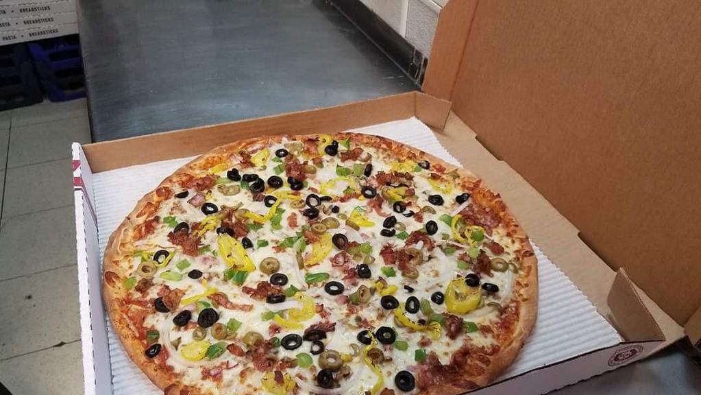 Works Pizza · Pepperoni, sausage, ham, onions, black olives, green peppers and mushrooms.