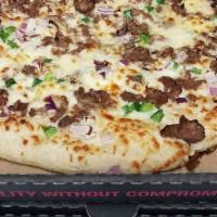 Philly Steak Pizza · Philly steak, onions, green peppers, mozzarella and provolone cheese. No sauce.