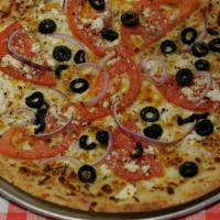 Mediterranean Style Pizza · Tomatoes, onions, black olives, feta, 6 different cheeses, dusted with Italian and Greek spi...