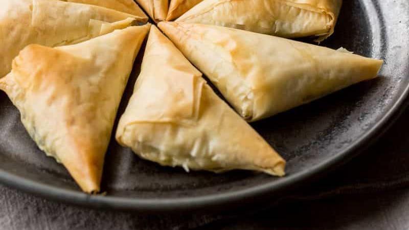 5 Piece Spanakopita · Classic Mediterranean favorite blend with spinach green onion feta cheese spices ricotta cheese wrapped in flaky phyllo dough.