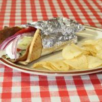 Gyro Sandwich · Traditional creamy cucumber sauce, choice of meat, lettuce, tomato and onion on fluffy pita ...