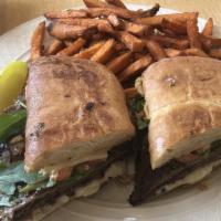 Roast Turkey And Avocado Panini · Sliced roast turkey breast, sliced apples, cranberry sauce, melted cheddar, and fresh avocad...