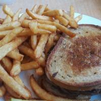 The Patty Melt · 8oz. Charbroiled black Angus patty with grilled onions and Swiss cheese on grilled rye.