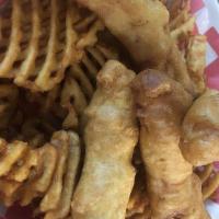 Crisp Fish And Chips · Tempura-style and served with waffle fries, coleslaw, and tartar sauce.