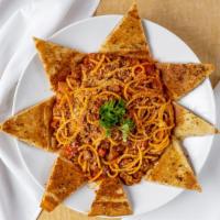 Spaghetti Bolognaise · Tossed in our basil bolognese sauce.